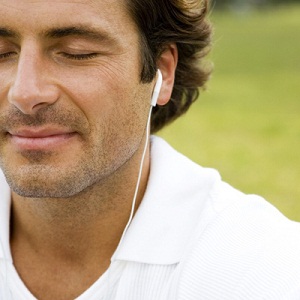 Cropped portrait man with earphones